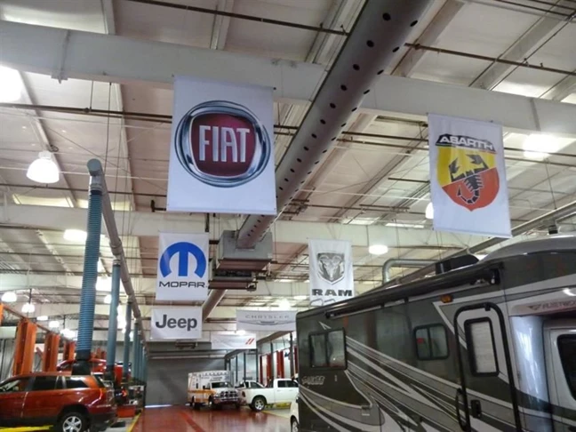 Custom banner installed in local automotive garage 